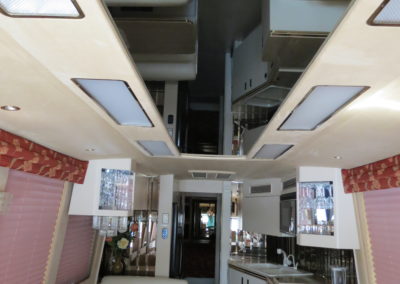 Living space showing mirrored ceiling and light panels